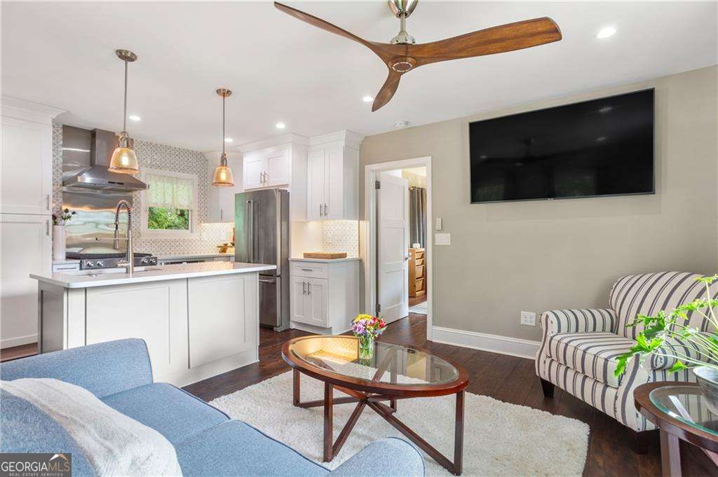 Luxury 1 bed & 1 bath near Emory University is ready for you to call home! Utilities and dedicated parking are included in the rent of this cute carriage house-style apartment just steps from Emory, Druid Hills High School, Decatur, walking trails, and tons of shopping & restaurants! You'll have your own private entrance in addition to a large outdoor deck and garden space. This residence is spacious (over 600 sq ft) and has been totally renovated with top-of-the-line stainless steel appliances, cabinets, hotellike bathroom, hardwood floors, and more! You'll find there is tons of natural light to the entire property. The full bathroom has a new vanity and large glass shower along with plenty of storage for linens. Kitchen is open off the large living room and features a gas stove including convection oven, breakfast bar, ample cabinet storage, and all new appliances. The unit has new, in-unit laundry and a large closet space. As you exit the residence from the kitchen/living room you are greeted by a large deck outside where you can enjoy a morning cup of coffee while soaking in the summer sun. You can enjoy the view below of the beautiful koi pond. Welcome home!