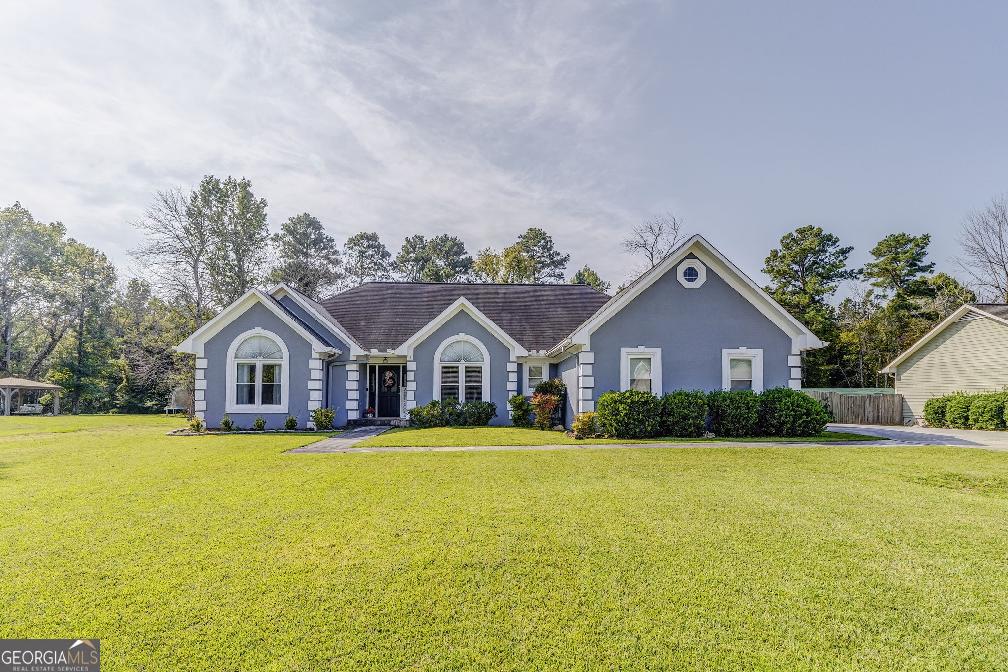 Welcome to your dream retreat in the heart of the sought-after Armuchee School District! Nestled in a quiet, well-kept neighborhood, this beautifully updated home offers the perfect blend of style, comfort, and convenience. Step inside to discover a warm, inviting interior featuring a cozy fireplace and sleek quartz countertops-ideal for relaxing evenings or entertaining guests. The kitchen comes fully equipped with modern appliances, and the entire home showcases luxury vinyl plank flooring with plush carpet in select rooms for added comfort. Fresh updates to the roof, windows, and exterior paint ensure peace of mind, while the private fenced yard and spacious patio create a perfect outdoor oasis. New blinds are already in place and will remain with the home. Whether you're starting a new chapter or looking for a move-in-ready gem, this home delivers charm, quality, and location-all in one irresistible package.