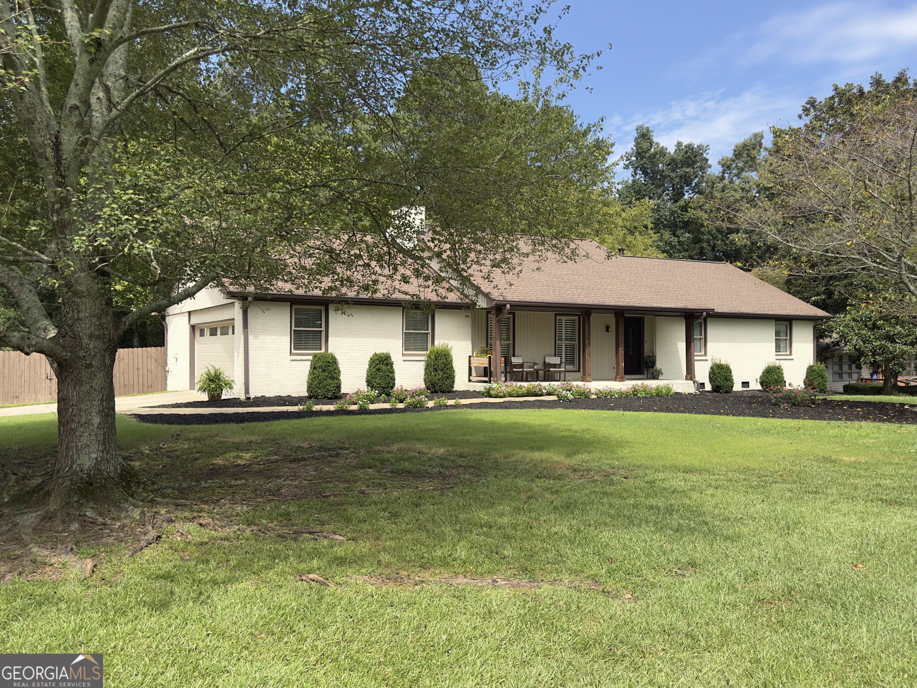 Charming Lakeview Brick Ranch Awaits You! Welcome home to this delightful, fully updated 2,496 sf brick ranch, where modern comfort meets peaceful lakeside living. This charming residence radiates warmth and relaxation, making it the perfect place to move in and start creating cherished memories. As you approach the home, you'll be greeted by its inviting curb appeal and a lovely front porch that beckons you to unwind. Imagine sipping your morning coffee here, soaking in breathtaking sunrises over the tranquil lake-there's no better way to start your day! Step inside to discover a beautifully renovated interior that radiates coziness and sophistication. The spacious living areas are filled with natural light, highlighting the tasteful finishes and open layout that seamlessly connect the living, dining, and kitchen spaces. Perfect for both entertaining and everyday living, this home invites you to relax and enjoy life to the fullest. The kitchen is a chef's dream, featuring modern appliances, a water filtration system, and ample counter space, all complemented by a stylish design that encourages culinary creativity. Whether you're preparing a simple meal or hosting a dinner party, this space is sure to impress family and friends alike. As the day winds down, transition to your private backyard. This outdoor oasis is the perfect venue for entertaining guests or enjoying quiet evenings with loved ones, or simply relaxing with a good book as the sun dips below the horizon. Front and back yards have landscape lighting. Retreat to the comfortable bedrooms, where restful nights await. Each room is generously sized, offering plenty of space for personalization. The bathrooms have also been thoughtfully updated, ensuring that both style and function are at the forefront. Located in the peaceful and welcoming Lake Jodeco neighborhood, this home provides easy access to local amenities, all while maintaining a sense of privacy. The lake offers opportunities for fishing, kayaking, and leisurely strolls, allowing you to fully embrace the beauty of nature right at your doorstep. Whether you're a first-time homebuyer or looking to downsize, this enchanting brick ranch promises a lifestyle filled with comfort, joy, and unforgettable moments. Don't miss your chance to call this captivating property your new home-schedule a viewing today and experience the magic for yourself!