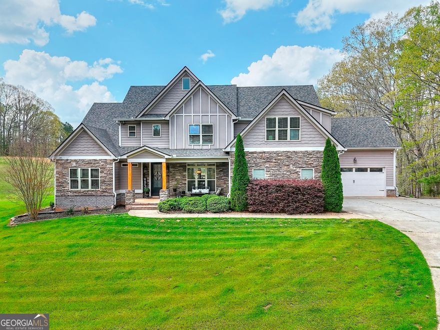 Looking for your perfect hideaway that is located just minutes from town? This custom built home is a STUNNER! Situated on just over 12 acres, this home offers the utmost in comfort, luxury and privacy. Outside you will enjoy the long, private driveway, ample parking space with two 2 car garages on main level.  This setting is truly serene! Inside the sellers took no shortcuts in their design decisions from the Oak Hardwood Flooring throughout to the two story family room with stacked stone fireplace, you will be blown away! Beautiful gourmet kitchen with an 8ft Island!  Large Primary bedroom and a guest room on main level with an additional three bedrooms upstairs each with their own private bathroom.  Need more space? The basement is a blank slate that is plumbed for a kitchen and bathroom ready for your finishing touches! One of the best spaces is definitely the covered back patio with long porch overlooking the beautiful backyard with room for a pool and more!  This one is a MUST see!  No HOA! EV Charger in garage.