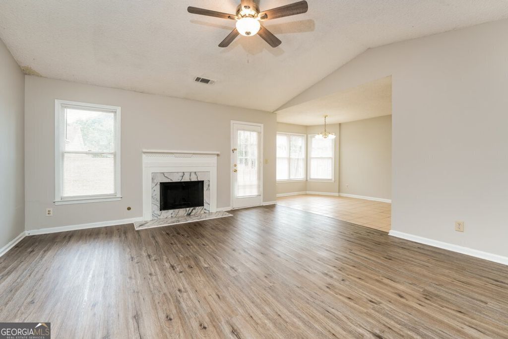 Photo of 2399 Morning Dew Place, Lawrenceville, GA 30044 (MLS # 10732056)