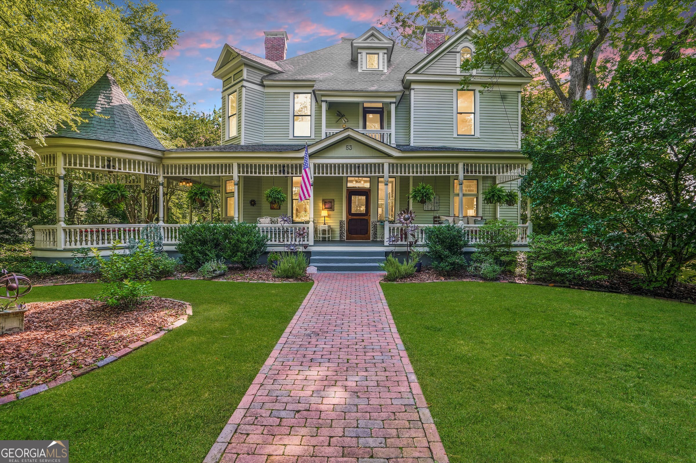 **Historic Elegance Meets Development Opportunity in Downtown Norcross** **Offering lower package pricing on house and lot combined compared to the two parcels separately.** Step into timeless charm with The Born House at 53 Born St, a meticulously restored Queen Anne Victorian masterpiece built in 1886. Included in this rare offering is the adjacent buildable .402-acre lot at 63 Born St, perfect for expansion, guest quarters, or investment potential. Together, the combined 0.837-acre estate offers a unique blend of heritage and possibility in the heart of Historic Norcross. See the separate standalone listings for: The Born House: GAMLS #10552208, FMLS#7609012. 63 Born St .402ac lot: GAMLS #10591418.
