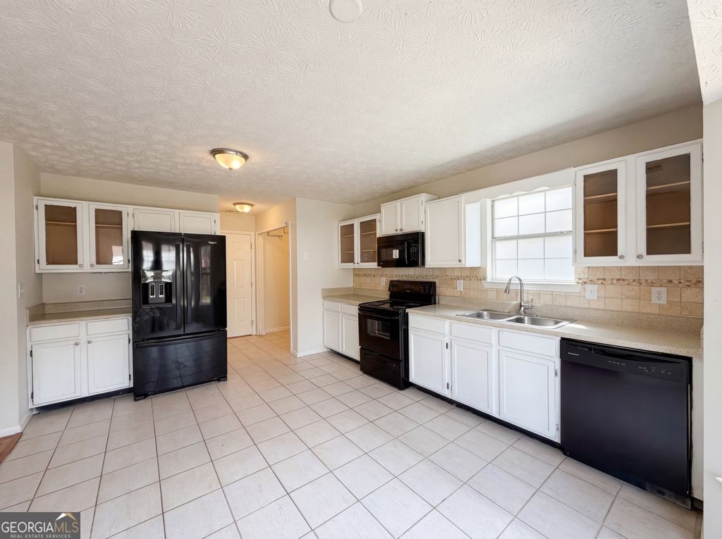 Photo of 5939 Farmbrook Lane, Rex, GA 30273 (MLS # 10717157)