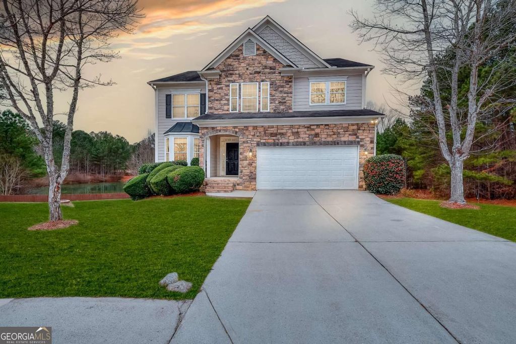 Photo of 1859 Woodland Run Trail, Loganville, GA 30052 (MLS # 10674218)