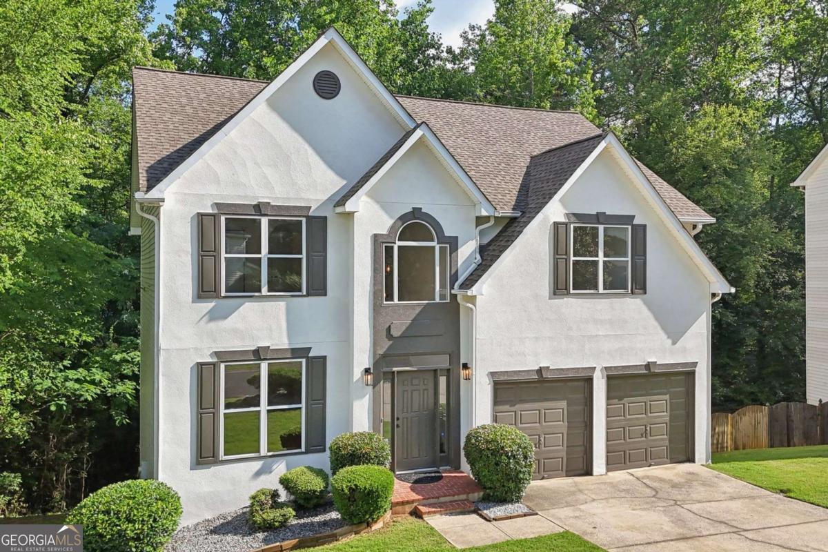 If you're looking for upscaled living, a home that's upsized for all of life's adventures, and upgrades galore, this is your golden ticket. Sitting up high on Blackjack Mountain in the coveted Eagle Ridge estate, this six-bedroom, 3.5-bathroom beauty is more than just a house, it's a labyrinth of lifestyle possibilities, where every turn leads to comfort, elegance, and surprises you never knew you needed. Skip the fixer-upper, this home is turn-key perfection. Are you the type who spends weekends rolling up your sleeves and getting mired in maintenance tasks? If so, look away! This isn't the home for you. The heavy lifting has already been done, and every surface has been thoughtfully refreshed. Instead, picture rolling into Marietta Square for brunch, a leisurely afternoon browsing boutique shops, or an evening of live music. No toolkits required, just a relaxed weekend exactly the way you want it. This stunning home has been given the full VIP treatment, so you don't need to lift a finger. The kitchen glow-up features custom cabinetry, Carrera quartz countertops, and sleek matte black finishes. The bathroom spruce-up includes polished porcelain tiles, stylish black fixtures, and modern lighting. The flooring level-up introduces brand-new engineered hardwoods, fresh carpet, and sophisticated tile throughout. The basement power-up offers two bonus rooms, a bathroom, a kitchenette, and fresh tile flooring, making it ideal for guests, an in-law suite, hobbies, or even an epic home theater. The bright home step-up brings recessed lighting, smooth ceilings, and a spacious attached kitchen level two car garage. A home filled with memories, now ready for new ones. For decades, this house has been more than just bricks and beams, it has been a home in the truest sense. Birthday candles have been blown out in the kitchen, bedtime stories whispered in upstairs bedrooms, and countless front-door farewells waved as loved ones ventured out into the world. Now, with the kids grown and thriving out of state, the original owners are ready to pass the torch to someone new. Your chance to fill these rooms with fresh laughter, new traditions, and unforgettable moments has arrived. Where upscale meets upcountry charm. With 0.29 acres of peaceful, wooded paradise, mornings here are spent sipping coffee with the birds as the tranquil creek flows below, and evenings are for stargazing without city distractions. But don't worry, you're still within arm's reach of everything. Major highways are just five minutes away, Marietta Square with its shopping, dining, and historic charm is only fifteen minutes down the road, and Downtown Woodstock is twenty minutes away for a lively atmosphere. When you crave big city energy, Downtown Atlanta is just twenty-five minutes away. Trade up! Eagle Ridge homes rarely grace the market, and this one is move-in ready with no corners cut. Whether you're growing your family, setting up a multigenerational oasis, or simply claiming your rightful place at the top, this home is your chance to elevate your lifestyle. Organize your private inspection today.