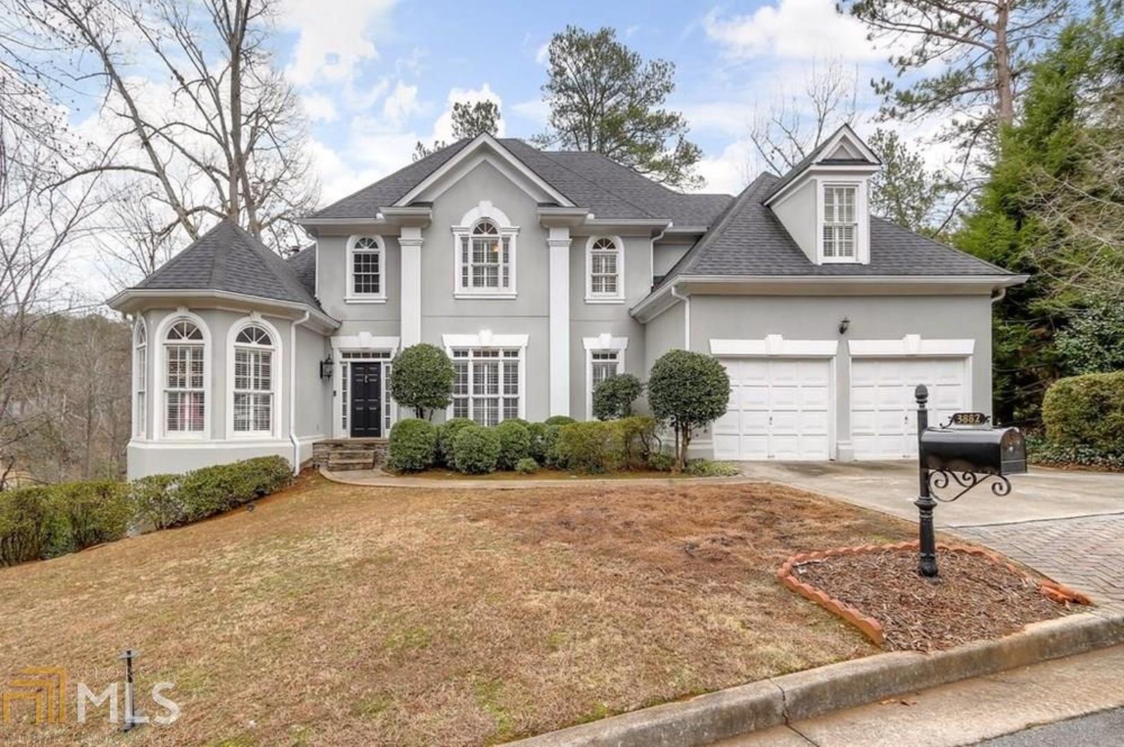 Gorgeous executive home in a quiet, private enclave, convenient to hospitals, shopping, dining & everything Brookhaven, Sandy Springs & Dunwoody have to offer. Hard-to-find master on main w/ brand new master bath! Renovated eat-in kitchen w/ white cabinets, island, double ovens, gas range, walk-in pantry, & granite countertops. Dark hardwoods throughout main, 2 story great room w/ expansive windows, elegant dining room, & office/playroom. 3 beds/2 baths upstairs - one ensuite bath and one jack n' jill bathFully finished terrace level w/ multiple living areas, full bath, bedroom, and ample storage. You will love the neutral paint colors, designer light fixtures & massive storage space.