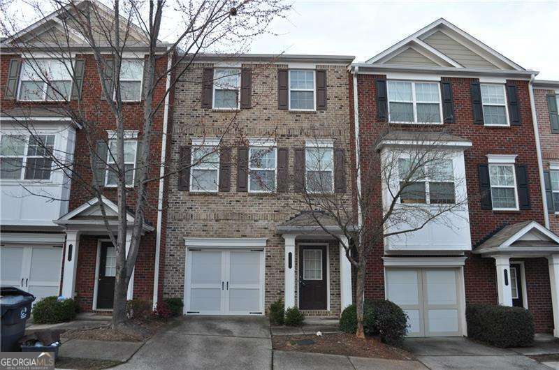 THIS BEAUTIFUL AND SPACIOUS TOWN HOME IS LOCATED MINS FROM I-85 AND ARENA CLOSE TO SHOPPING AND RESTAURANTS IN A VERY SOUGHT AFTER SCHOOL DISTRICT LOCATED IN A GATED NEIGHBORHOOD. THE HOME IS LOADED WITH UPGRADES AND IS RECENTLY PAINTED. THE HOME FREATURES ONE CAR GARAGE, UPGRADED LIGHT FIXTURES, NICE FLOORING ON ALL THREE THREE FLOORS (CARPET IS ONLY ON THE STAIRCASE), NEW FIREPLACE, AND A NEW HVAC UNIT, NICE BATHROOMS. PRICED VERY AGGRESSIVELY TO SELL. WON'T LAST LONG. LOWER LEVEL HAS BED/BATH, PERFECT FOR IN LAW SUITE. LANDLORD IS A LICESNSED REAL ESTATE AGENT IN THE STATE OF GA.