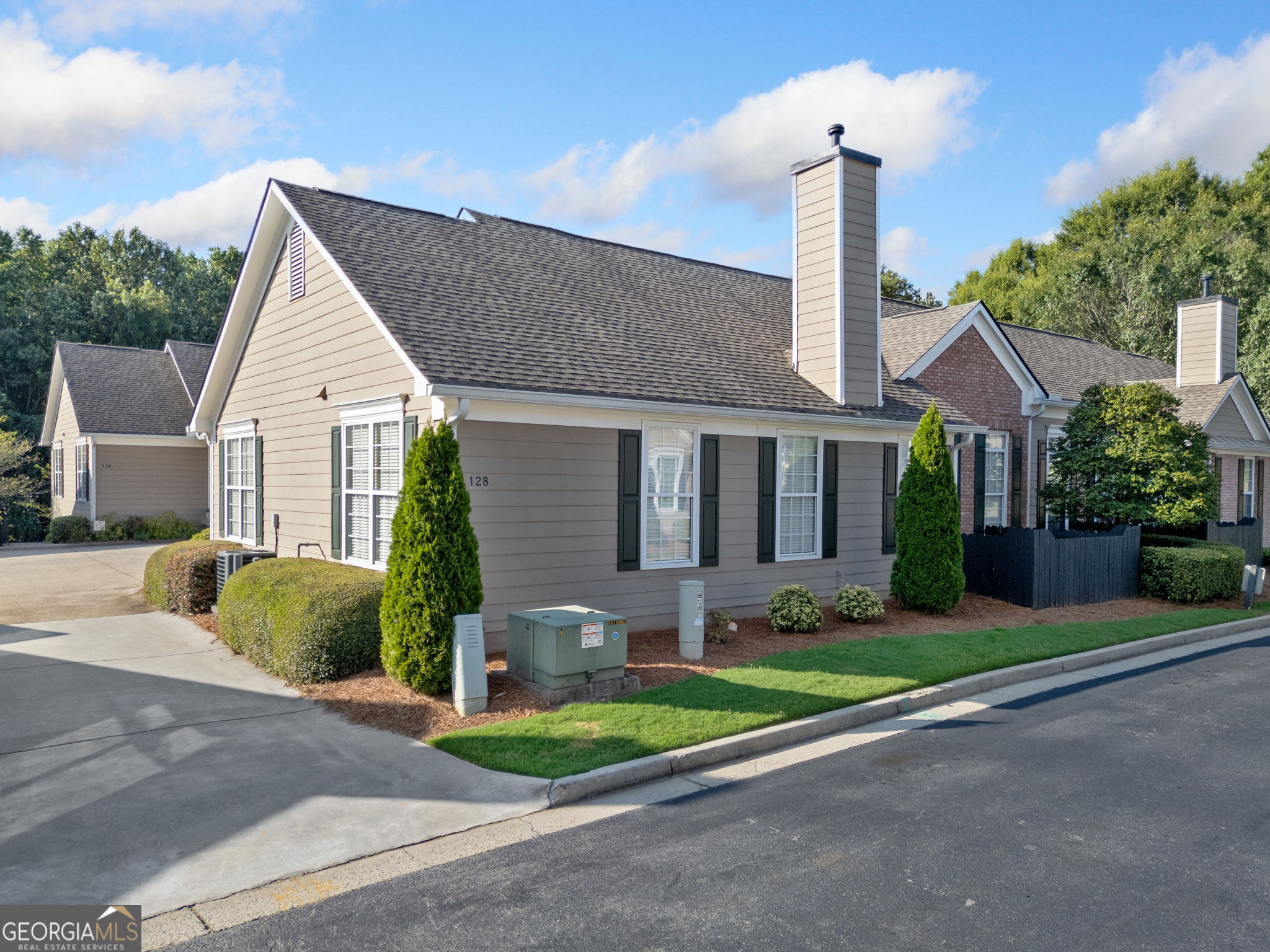 Immaculate and fully updated 3-bedroom, 2-bath home located just across the Cobb/Paulding line in a quiet, well-maintained community. This one-level home offers easy living with minimal steps and a thoughtful open-concept layout featuring a spacious family room with fireplace, dining area, and a beautifully redesigned kitchen. The kitchen boasts brand-new cabinets, countertops, appliances, and layout-perfect for both everyday living and entertaining. The neighborhood is not a 55+ community and is open to all age groups. Throughout the home, you'll find new luxury LVP flooring, fresh interior paint, and large-format tile in both bathrooms. The primary suite features a generous walk-in closet, double vanity, and updated shower with new doors. Two additional bedrooms share a renovated full bath with a new vanity, ideal for guests or a home office. Additional highlights include a new roof (2020), new HVAC (2022), new hot water heater (2024), and a two-car garage. Enjoy a private patio area for morning coffee or evening relaxation. The HOA covers lawn care and exterior maintenance, offering a virtually maintenance-free lifestyle. Community pool and clubhouse are a quick walk across the street, no driving required! Conveniently located near shopping (Walmart, Costco), dining, Paulding County Hospital, and medical offices. With all the recent upgrades, this home feels like new (and most of it is!) -don't miss your chance to make it yours!