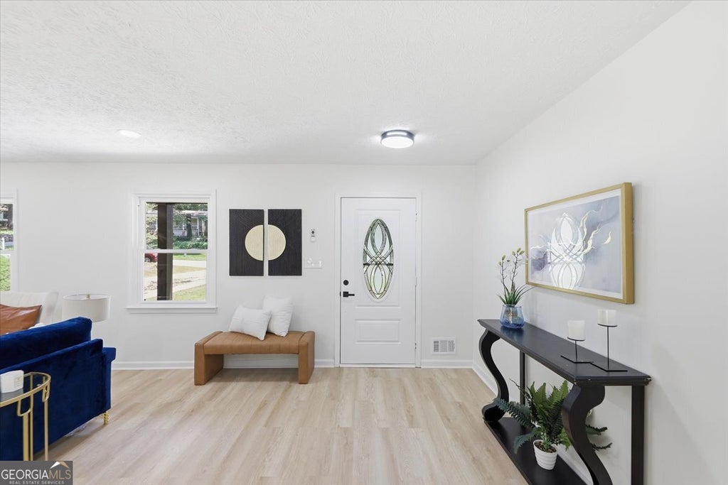 Photo of 2115 Lost Forest Lane SW, Conyers, GA 30094 (MLS # 10784298)