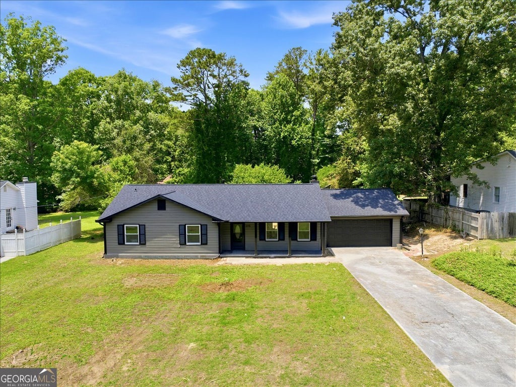 Photo of 2115 Lost Forest Lane SW, Conyers, GA 30094 (MLS # 10784298)