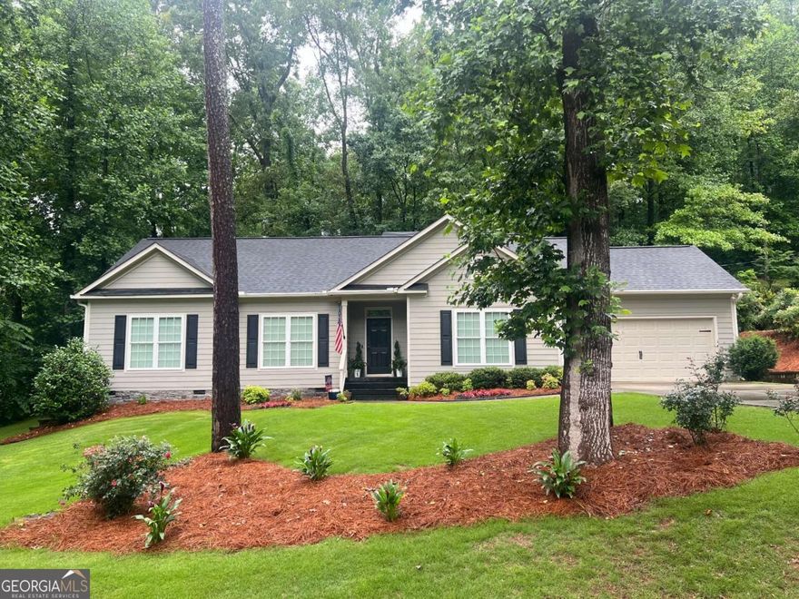Welcome to this beautifully maintained 3-bedroom, 2-bathroom ranch-style home located in a quiet, desirable area of Marietta-with no HOA restrictions! Featuring a spacious open floor plan, this home offers comfort, functionality, and modern touches throughout. The inviting family room centers around a cozy fireplace, perfect for relaxing or entertaining. Just off the family room, you'll find a large kitchen complete with a generous island, ideal for meal prep, casual dining, and hosting guests. The spacious owner's suite is tucked away for privacy and includes a large en-suite bathroom with dual vanities, a separate shower, and a large closet with ample storage. Two additional secondary bedrooms provide plenty of space for family, guests, or a home office, and are conveniently located near a full guest bathroom. A dedicated laundry room adds extra convenience and storage. With one-level living, no HOA, and a prime Marietta location, this home offers the perfect blend of comfort, freedom, and accessibility.