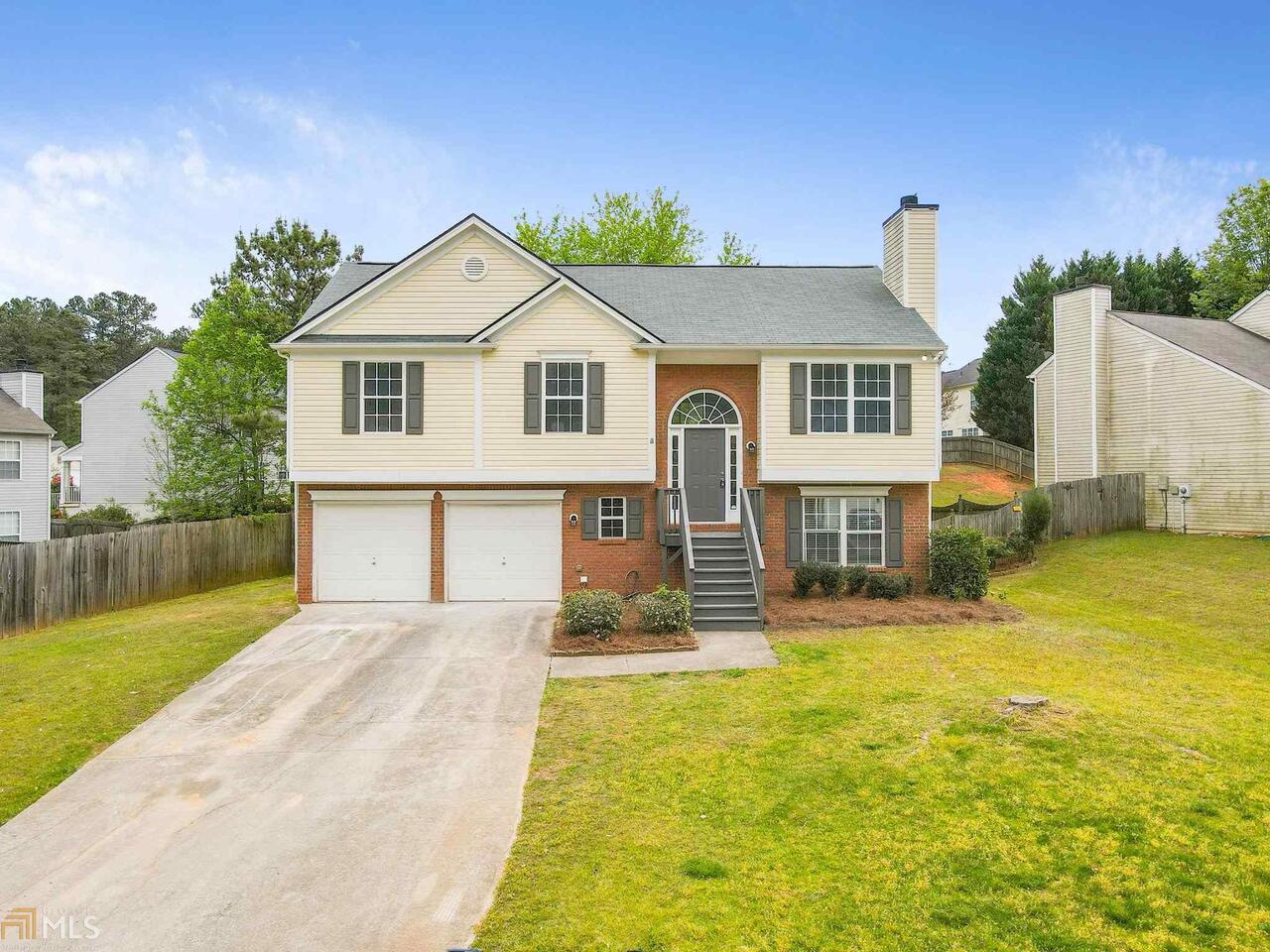 Beautiful renovated 4 bed 3 bath split foyer home. Bright and open floor plan with tons of windows and natural light. New kitchen with center island, white shaker cabinets, granite counters, and stainless steel appliances. Huge vaulted master bedroom and bath with double vanities. Finished basement provides tons of extra space including a massive bonus room with walkout entry to the back patio and full bath. Great schools and conveniently located to local shops and restaurants.