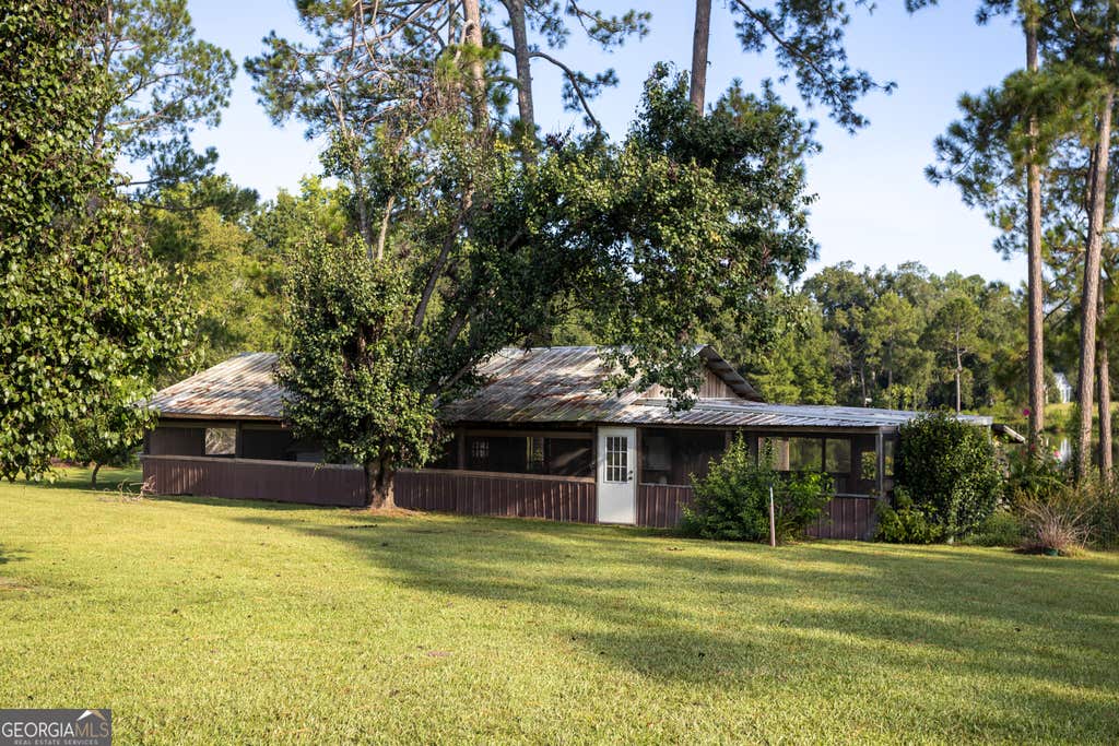 Photo of 1360 Scarboro Church Rd, Twin City, GA 30471 (MLS # 10826961)
