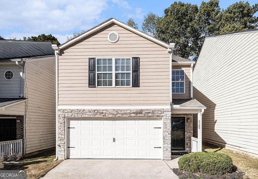 Beautifully Updated Home in Prime College Park Location! Enjoy the Perfect Blend of Comfort and Convenience just minutes from Downtown College Park, MARTA, and Hartsfield-Jackson Atlanta International Airport. This Move-In Ready Home offers effortless access to Vibrant Shops, Local Restaurants, Parks, and Major Highways, all while tucked in a Quiet, Established Community. Step inside to find a Light-Filled Fireside Living Room with New Luxury Flooring and a seamless flow into the Dining Area complete with access to the Private Fenced Backyard and Patio, perfect for relaxing or entertaining. The Updated Kitchen showcases White Cabinetry, Granite Countertops, Stainless Steel Appliances, Modern Tile Backsplash, and a Walk-In Pantry. A convenient Powder Room completes this level. Upstairs, a Bonus Flex Space provides versatility for a Home Office, Playroom, or Media Area. The Spacious Primary Suite impresses with a Walk-In Closet and a Stylish Ensuite Bathroom featuring a Granite Vanity and a Glass-Enclosed Shower with Designer Tile. Two additional Bright Bedrooms share a Full Hall Bathroom. Recent upgrades include a New Roof (2022), New Carpet (2024), Updated Lighting and Ceiling Fans, Smart Thermostats (Google Nest + Ecobee), New Garage Door System (2025), and Fresh Interior Paint. Additional enhancements include a Leaf Filter System (2024) no more gutter cleaning and an ADT-Ready Smart Security System complete with a Google Nest Video Doorbell, 1st Level and Backyard Cameras, (2) Google Hubs, (2) Google WiFi Extenders, and Door/Window Sensors throughout, including the Garage Door. The Fenced Backyard features Artificial Grass for easy maintenance and a Private Patio Retreat backing to lush greenery. This thoughtfully updated home combines Modern Comfort, Smart Home Features, and an Unbeatable Location just minutes to everything College Park has to offer!