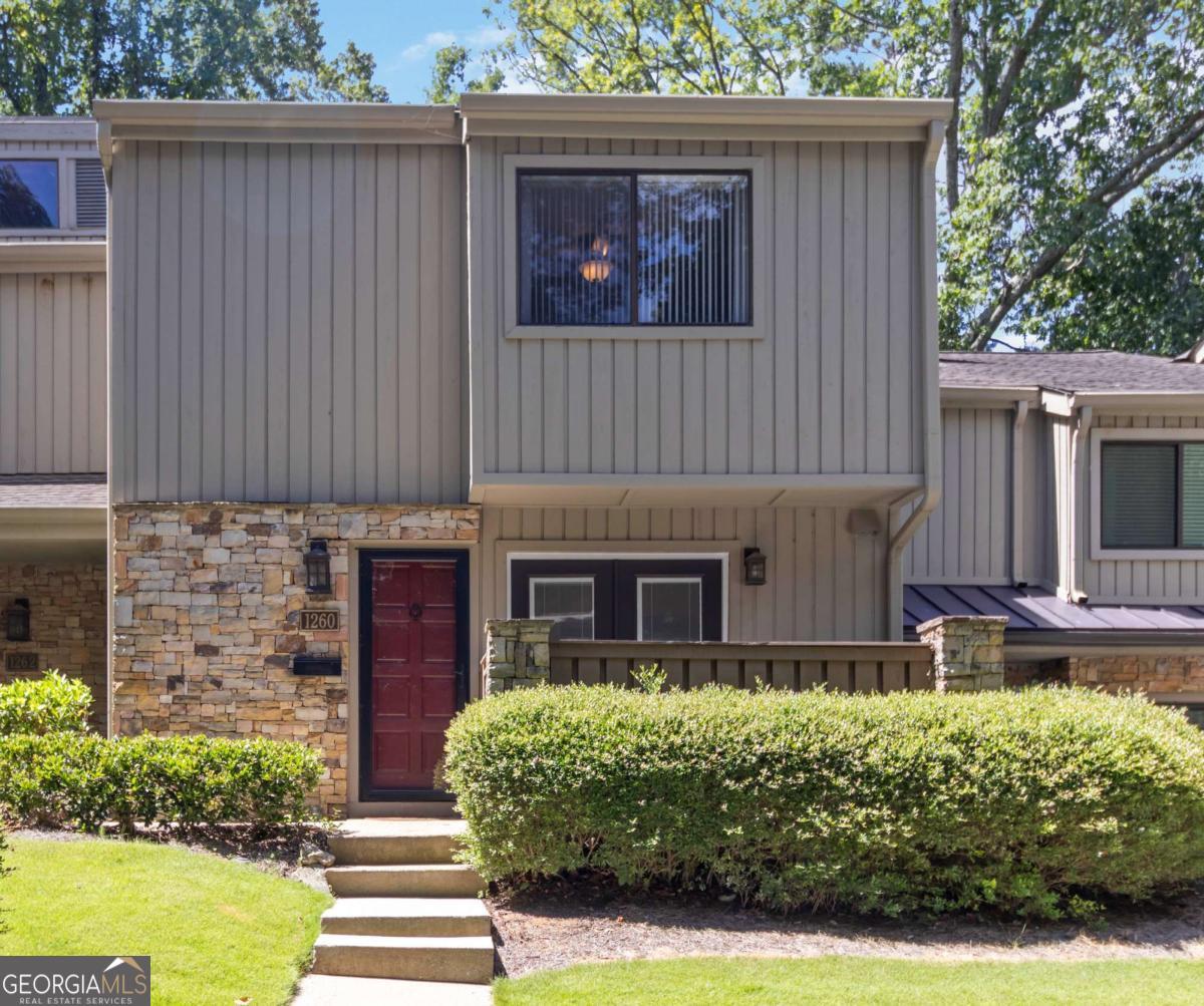 Nestled in the heart of Brookhaven, a stone's throw from the hustle and bustle of Buckhead, you will love the serene peace of your wooded private patio of this updated 2-bedroom, 1.5 bath home. Kitchen has beautiful new flooring, new oven and microwave, and beautiful new French doors to your little patio off the kitchen. Enjoy this open main living area with plenty of space for a large dining table and living room furniture for comfortable living and entertainment. Upstairs, the primary bedroom offers a closet that spans the full width of the bedroom, and a private balcony overlooking the wooded patio below. The second bedroom has a walk-in closet AND an additional storage closet. Plenty of additional closet space in the hall upstairs lends itself to ease of living. The full bathroom upstairs is updated with two separate vanities, tub/shower combo, and a washer/dryer that remains with the property. The 2 deeded parking spaces in front of the condo allow easy access to the main level. Enjoy a short walk to the amenities of pool and clubhouse. In addition to all that Brookhaven has to offer, this quiet, well-managed Druid Knoll Community is the perfect location, within minutes of Buckhead/Lenox/Phipps Plaza to the west, and a quick zip over to I-85/N Druid Hills exit to the east, where you find the new Children's Hospital of Atlanta, Emory Musculoskeletal Institute, and many great shopping and dining options all around. Prime location at a very affordable price!! SPECIAL FINANCING OPTIONS AVAILABLE WITH PREFERRED LENDER.