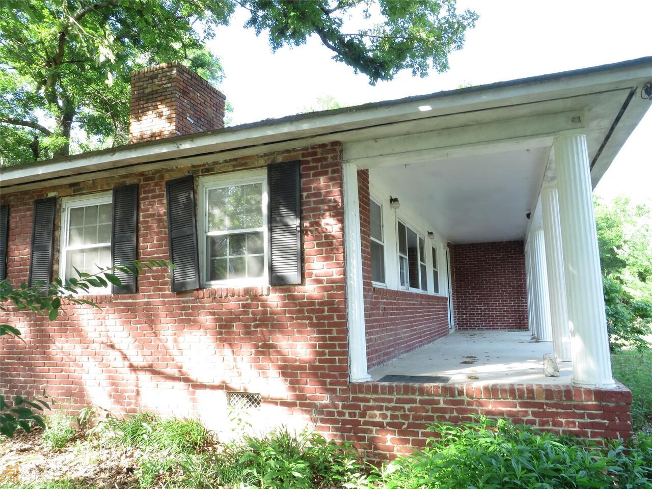 All brick ranch newly renovated interior on over 1 acre w/in-ground pool in Twiggs County! Home features hardwood floors throughout, nice kitchen with lots of cabinets, eat-in kitchen & formal dining has 2 sided fireplace, lots of charm throughout. Master suite is nicely done w/modern master bath that includes circular stand-up shower, and large garden tub. Plantation shutters throughout, new windows, Hvac looks newer, stove, sep. oven, dishwasher and microwave is included. Full unfinished basement. Backyard features inground pool, 2 outbuildings and fenced-in yard. Foreclosure. Sold-as is, No Sellers Disclosure.