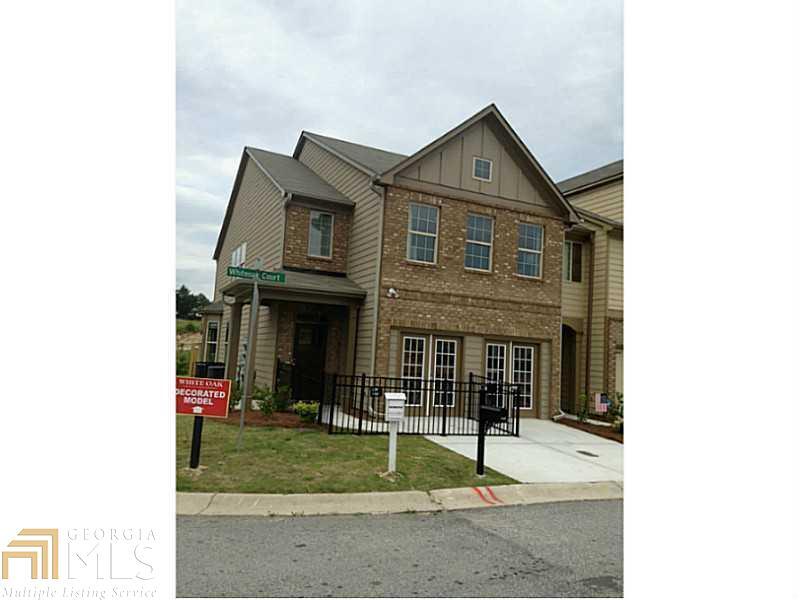 MUST SEE THIS END UNIT!! These 2-level homes feature hardwoods on the main, Gourmet kitchen with island & granite countertops. Master features tile floors & raised double vanities. Homes also include security system and 8x10 patio. Very open floor plan and $7500 BUYER BONUS incentive for upgrades and/or closing costs with preferred lender Bank South AND Washer/dryer, refrigerator, 2" blinds and privacy fence!!
