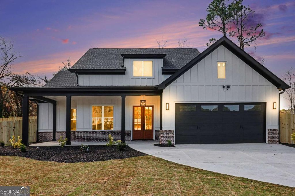 Photo of 1031 Grayson Highway, Lawrenceville, GA 30045 (MLS # 10756108)