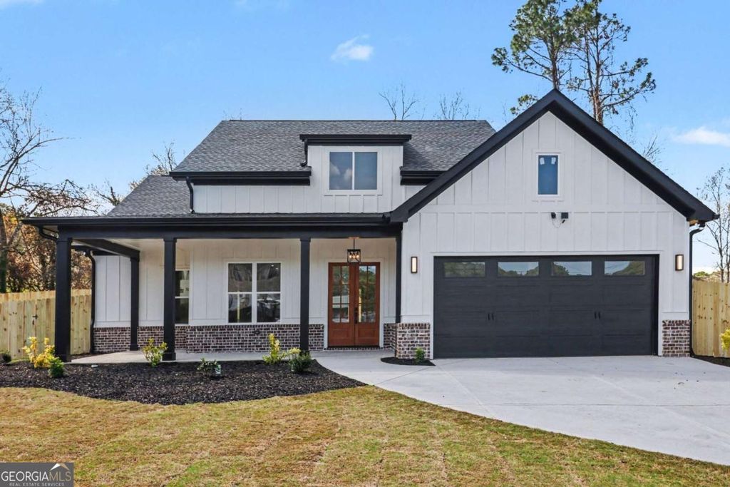 Photo of 1031 Grayson Highway, Lawrenceville, GA 30045 (MLS # 10756108)