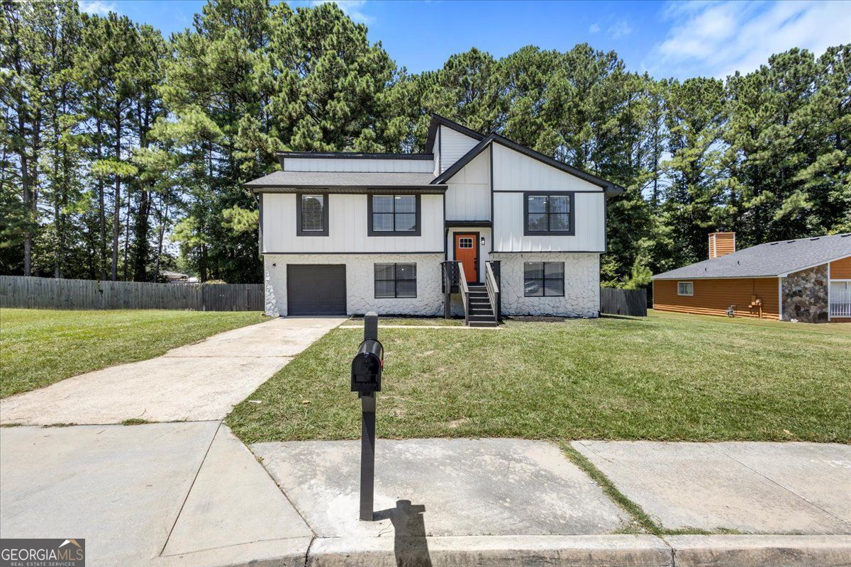 Beautifully remodeled home is ready for you! This property features 5 bedrooms and 3 full bathrooms with modern upgrades.The gourmet kitchen boasts NEW quartz countertops, stainless steel appliances, and brand-new white and Grey cabinets, creating a sleek and stylish space. Huge Private Backyard-New Roof and New HVAC. The amazing home is conveniently located near shopping, dining, and the interstate. Don't miss out on this perfect blend of comfort and convenience! Don't miss your chance to make it yours! You may be eligible to receive up to $15,000 in down payment and closing cost assistance on this property through our preferred lender, Derwin Davis at Regions Bank. Interested in seeing if you qualify for this incredible grant? Call Ola today for more information on how to get pre-approved!