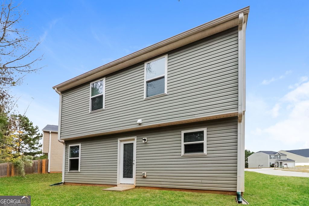 Photo of 7103 Tanger Boulevard, Riverdale, GA 30296 (MLS # 10729180)