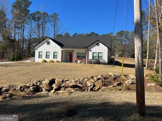 Custom built, one level Golf course home in beautiful Fairfield Plantation. This home sets on the 7th hole, and is located on a double lot. Home features an open floor plan that is perfect for entertainment and family get togethers. Beautiful granite in kitchen that features a 10.5 x6.5 ft bar/table. Open living room/dining area with gas fireplace and plantation shutters on inside. This leads to a screened porch and patio. Master is spacious with easy access to master bath with walk in shower featuring beautiful tile and lots of closet space. Split floor plan gives second and third bedrooms on front of house with full bath. Oversized garage is side entry and is over 600 sq ft and can accommodate two cars and golf cart. concrete cart path to course . This home also has modern black windows, Generac system, 120 gallon propane tank, Gutter guards, small outside storage building, wireless camera system, and insulated garage doors and attic. Must see to appreciate all the extras in this home.