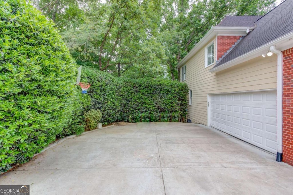 Photo of 1920 Woods River Lane, Duluth, GA 30097 (MLS # 10836774)