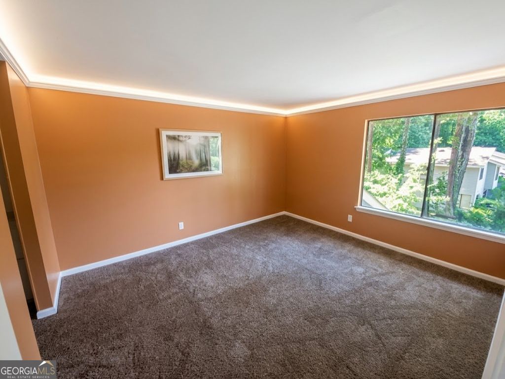 Photo of 8596 Creekwood Way, Jonesboro, GA 30238 (MLS # 10790439)