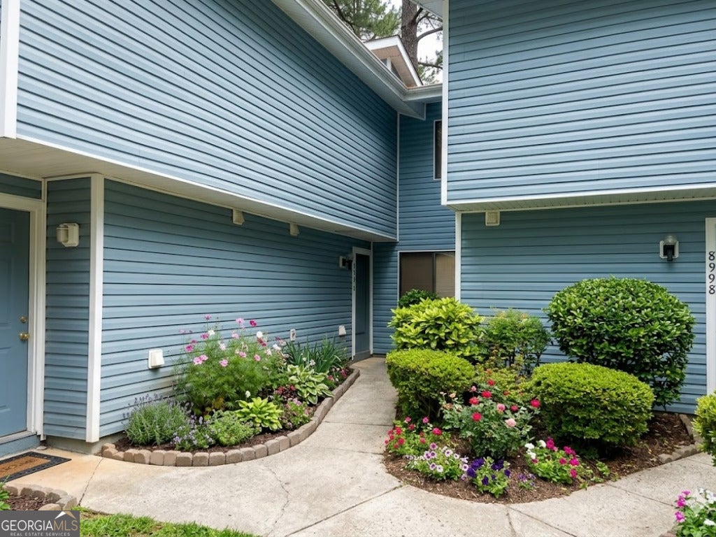 Photo of 8596 Creekwood Way, Jonesboro, GA 30238 (MLS # 10790439)