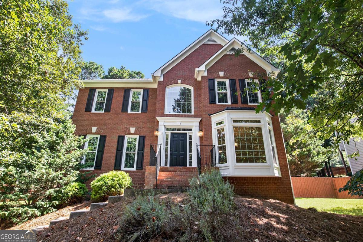 Welcome to 1950 Stonewyck Court! This updated and beautifully maintained home is nestled on a quiet cul-de-sac in the desirable Habersham at Lanier community. This 4-bedroom, 2.5-bath home offers fresh interior paint and brand-new carpet throughout, creating a bright and move-in-ready space. You'll love the completely renovated master and hall bathrooms, featuring modern finishes and designer touches. The home also boasts a brand-new plumbing system for added peace of mind. Inside, enjoy a spacious and functional layout with a formal dining room showcasing a stunning floor-to-ceiling bay window, and a cozy fireside family room with built-in bookcases for added character and charm. The fully fenced backyard is perfect for entertaining, pets, or play. Additional features include a 2-car garage, generous lot size, and proximity to top-rated Forsyth County schools, shopping, and Lake Lanier. Don't miss your chance to own this beautifully updated home in a prime Cumming location!