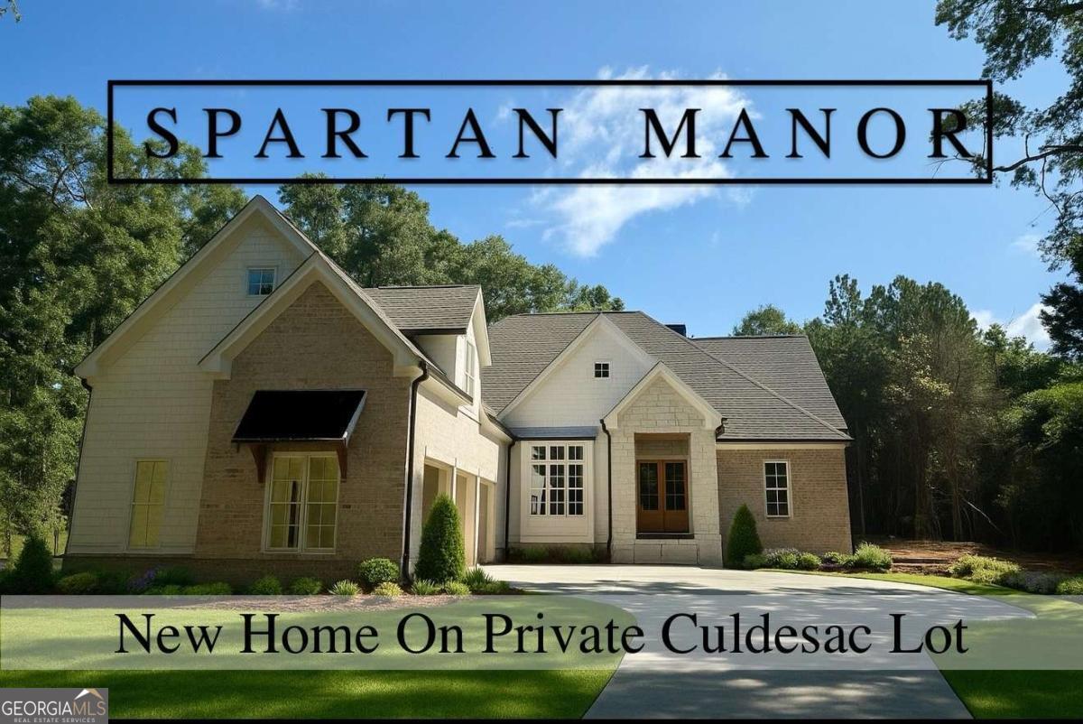New Luxury Home in Spartan Manor on Private 2.8 Acre Culdesac Lot! Nestled 250 feet from the road, this home offers what others simply cannot in Spartan Manor - a private setting. A curved drive leads gently uphill through the large oaks for a captivating approach to this custom 5,300 sq ft home by Brouwer Building Group. The setting around the home is both private and level - a real treasure if you've been looking! Plenty of space around the home for a pool, manicured lawns, etc all in an easy to work with level space. Beyond the grounds, you'll also fall in love with the layout and designer finishes in this custom home! Top tier finishes include Custom Cabinetry, Viking Appliances, Designer Lighting & Plumbing Fixtures, White Oak Site-Finished Flooring, 10 Ft Ceilings & 8 Ft Doors on Main, Spray Foam Insulation, Upgraded HVAC & more! Layout features 3 Bedrooms on Main, 2 Bedrooms Upstairs + 2 very large bonus areas ideal for media, play, office, gym... you get the picture. It's a great layout for all life stages. The extra bedrooms on main can be used every day or easily function as guest bedroom and home office. Main Living areas are bright & open and offer a seamless view to the back yard from every area! The Spartan Manor / Estates community features homes in the $1.6m to $3m range and a fabulous location with an Athens address in Oconee County. Make your appointment to view 1763 Olympus Ct today while there is still time to make some final selections!