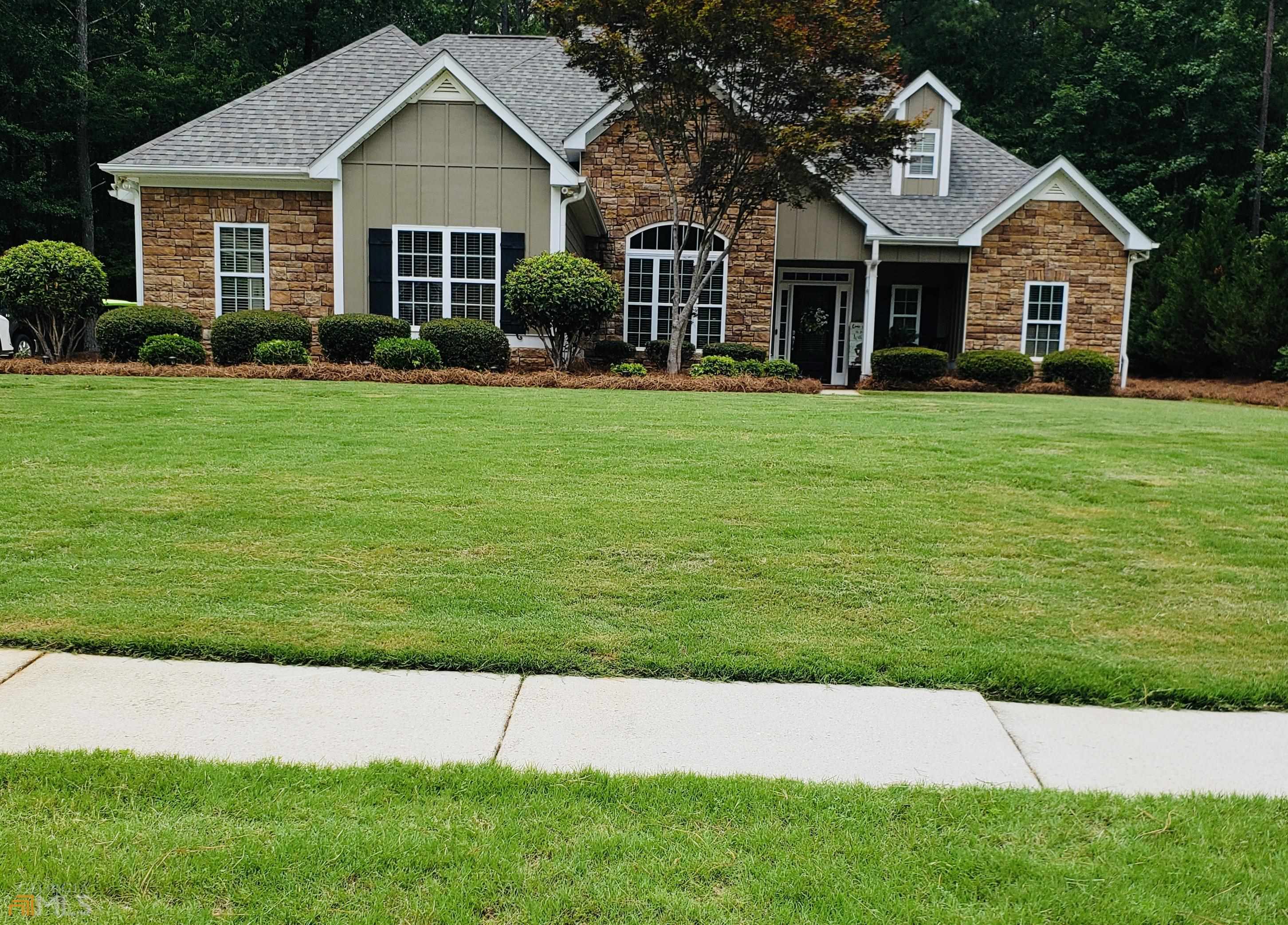 Must see this beautiful Craftsman style home located in one of Ola's most sought out neighborhoods-home sits on 1.23 acres, wooded back yard with gazebo for outdoor entertainment. This home features 4 bedrooms, 3 1/2 baths with master suite on the main, walk in closet, double vanity, spacious bathrooms and trey ceilings, Two additional bedrooms on the main with additional teen suite upstairs with separate bath and walk in closet. Stainless steel appliances, breakfast bar, pantry and granite counter tops. Tile floor in all bathrooms, hardwoods on main level except master bedroom. Open concept with gorgeous fireplace in family room. MUST SEE! Outside of home has been completely repainted. Owner is a licensed Real Estate agent in Georgia.