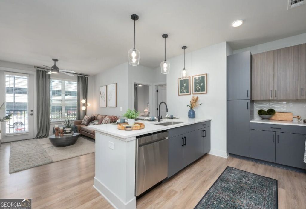 Photo of 1400 Laurel Crossing Parkway #1105, Buford, GA 30519 (MLS # 10655514)