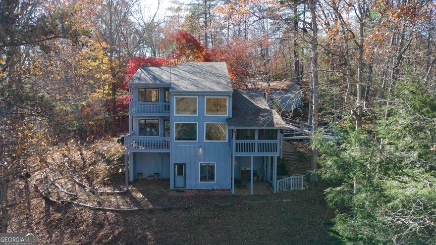 ***Priced below recently appraised value!*** This peaceful Dahlonega retreat is set along a gentle stretch of the Chestatee River. Thoughtfully maintained and full of natural light, this home offers a warm, open layout that makes everyday living feel easy and inviting. The main level flows comfortably through bright living spaces, cozy gathering areas, and a kitchen designed for connection and convenience.    Step outside to wide porches, a spacious backyard, and calming river views that create the perfect backdrop for morning coffee, quiet evenings, or hosting friends. The setting feels private and relaxing, yet you're just minutes from downtown Dahlonega, UNG, local shops, award-winning wineries, outdoor trails, and all the natural beauty North Georgia is known for.    With its blend of comfort, charm, and an effortless connection to nature, this home is a rare find in one of Dahlonega's most desirable locations.