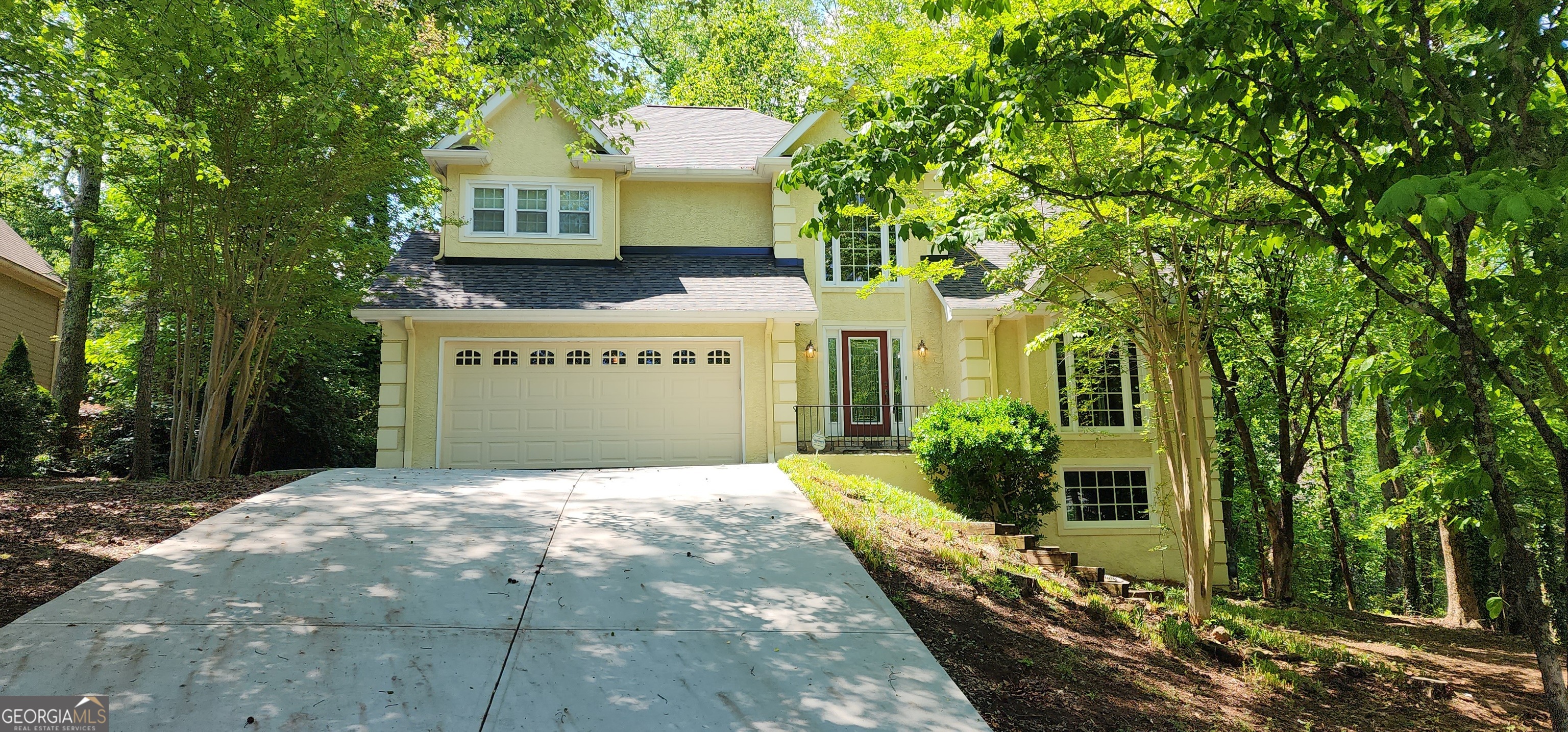 Explore your ideal home in the established Highland Pointe subdivision. This well maintained four bedrooms and three bathroom home provides ample living space! Walk into an open foyer with a view of the living room, dining room, and high ceilings. Kitchen and family room are open with a useful wet bar between, along with a half bath. Large back deck great for entertaining or having a enormous cookouts with this beautiful weather approaching. Upstairs you will be greeted with a primary suite featuring a balcony and a large primary bathroom, with a walk in closet . Just down the hall there are three additional bedrooms. One room could be used as an office. This home offer flexibility for your families needs. Two car garage to prevent pollen build up on your car, and a full unfinished basement waiting for your creativity for more living space or an extra large rec room. New 50 year roof and water heater. Superb HOA is optional for this address for more details or a private showing call Patricia Hunter @ 770-480-4673.