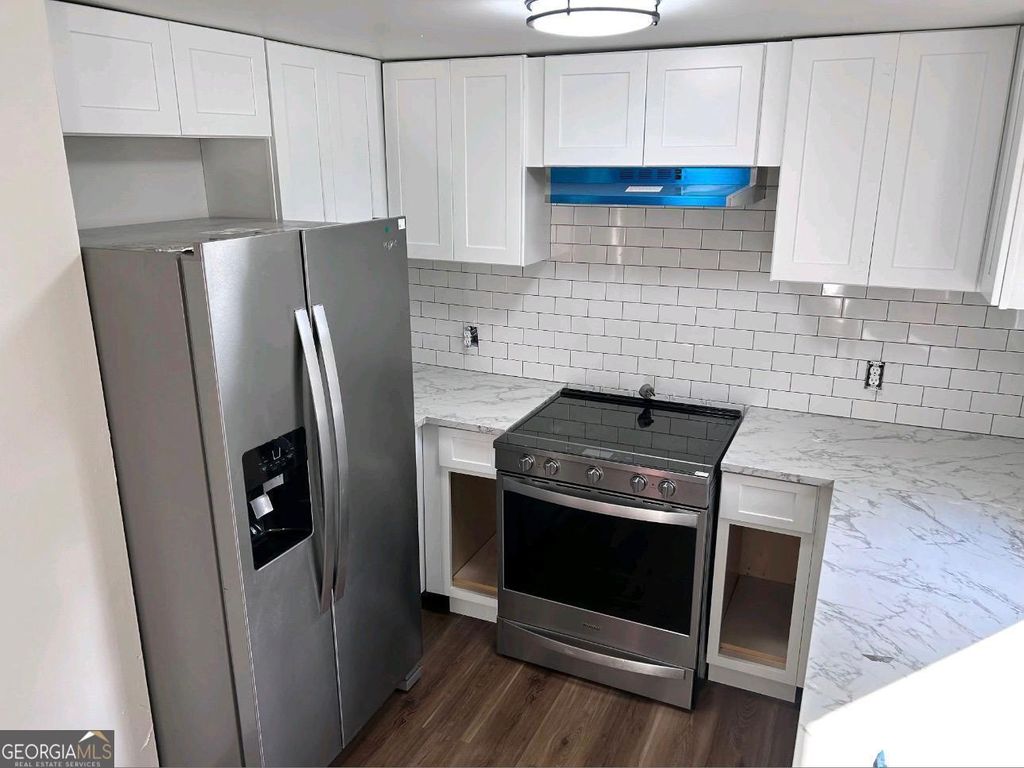 Photo of 15 Dixie Drive, Stockbridge, GA 30281 (MLS # 10695849)