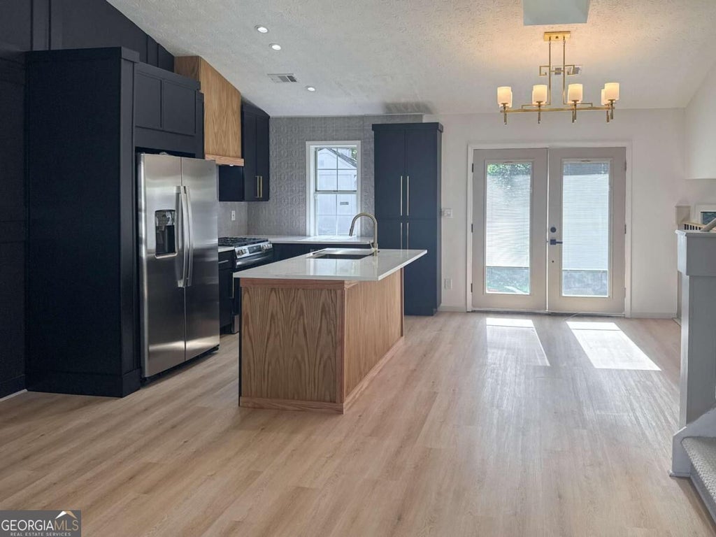 Photo of 6033 Old Wellborn Trace, Lithonia, GA 30058 (MLS # 10875842)