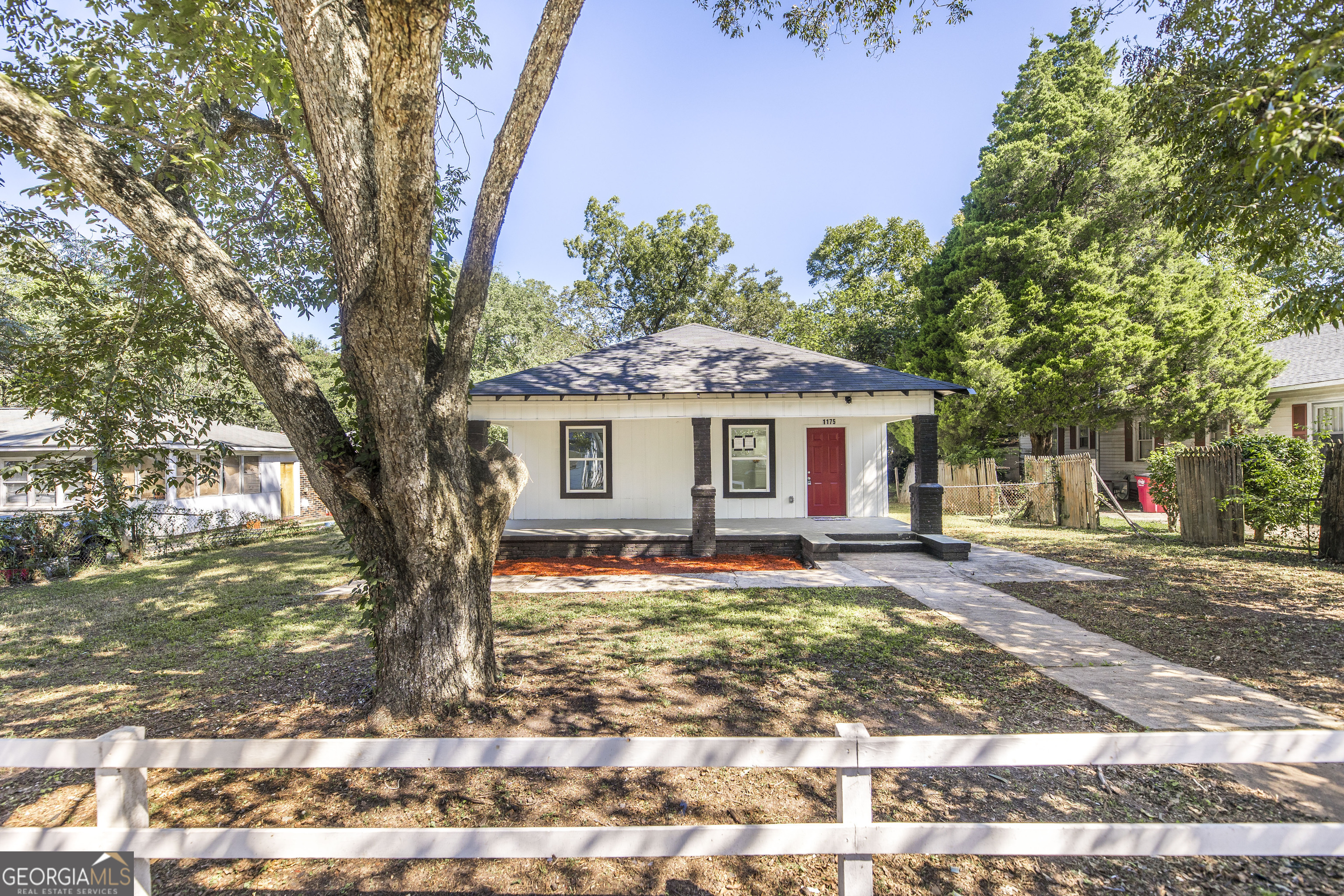 Fully renovated and move-in ready, this 4-bedroom, 2-bath home combines classic charm with modern finishes. The open floor plan features fresh LVP flooring, neutral paint, and abundant natural light throughout. The kitchen offers brand-new white cabinetry and a seamless layout flowing into the living area, providing a blank canvas ready for your personal touch. The primary suite boasts a spacious bath with dual vanities and a fully tiled shower. Outside, enjoy the inviting covered front porch, fresh landscaping, and a detached garage that enhance both curb appeal and functionality. Conveniently located with quick access to the interstate, this turnkey property is ideal for a wide range of buyers. Property is Sold "As-Is"