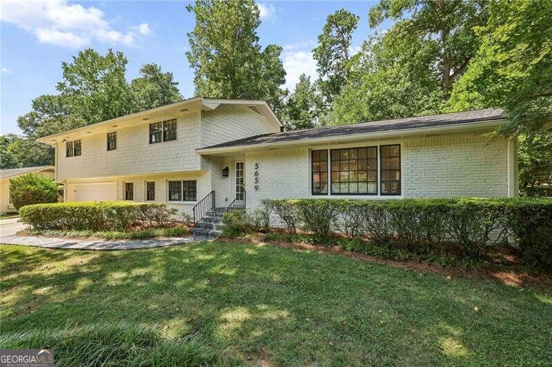 A wonderful offering in popular Mill Glen neighborhood. This great house is located in the award winning Austin Elementary school district. This house offers a very open light and bright floor plan. The gourmet kitchen with stainless steel appliances is very spacious and features quartz countertops. The breakfast area is filled with sunlight and opens onto the deck for easy outdoor entertaining and cook-outs. The kitchen has been opened to the family room/living room area. Hardwood floors are found throughout most of the entire home. The family room/living room is very spacious and offers great natural daylight. In addition to the family room/living room, there is a large informal den on the lower level featuring a fireplace and built-ins. The upper level split features four bedrooms including an extra spacious primary suite. There is a separate laundry room with washer and dryer that remain. The back yard is very large and completely private. If you are looking for a great neighborhood and great house to call home, then 5659 Mill Trace Drive is an offering you do not want to miss out.