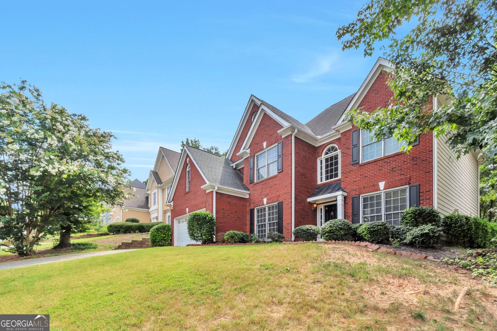 Photo of 1444 Oglethorpe Drive, Suwanee, GA 30024 (MLS # 10821489)