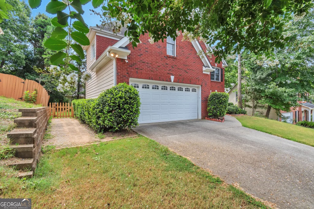 Photo of 1444 Oglethorpe Drive, Suwanee, GA 30024 (MLS # 10821489)