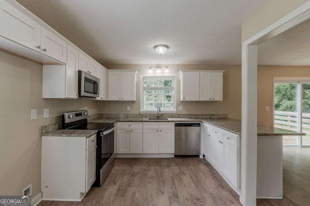 Photo of 1202 Palisades Lane, Ellenwood, GA 30294 (MLS # 10709480)