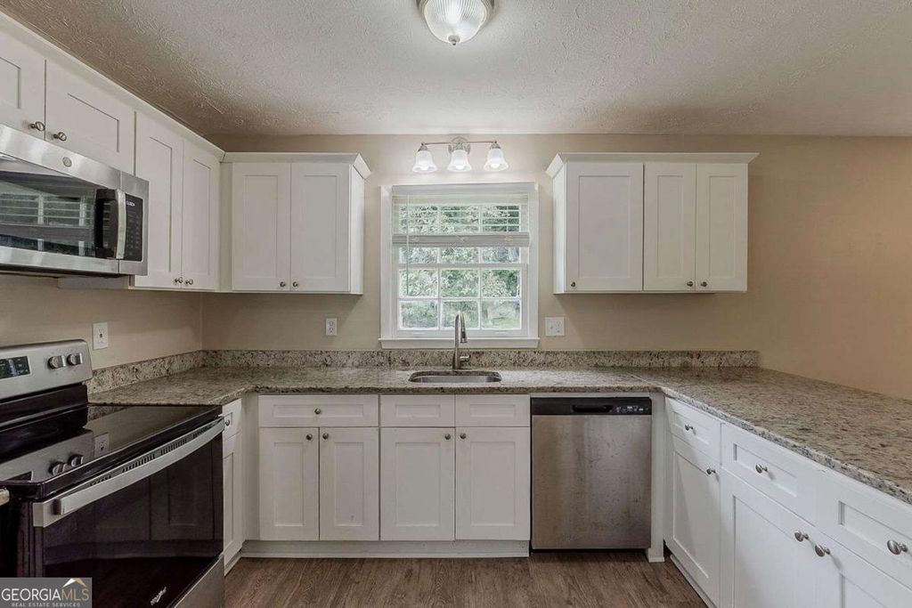 Photo of 1202 Palisades Lane, Ellenwood, GA 30294 (MLS # 10709480)