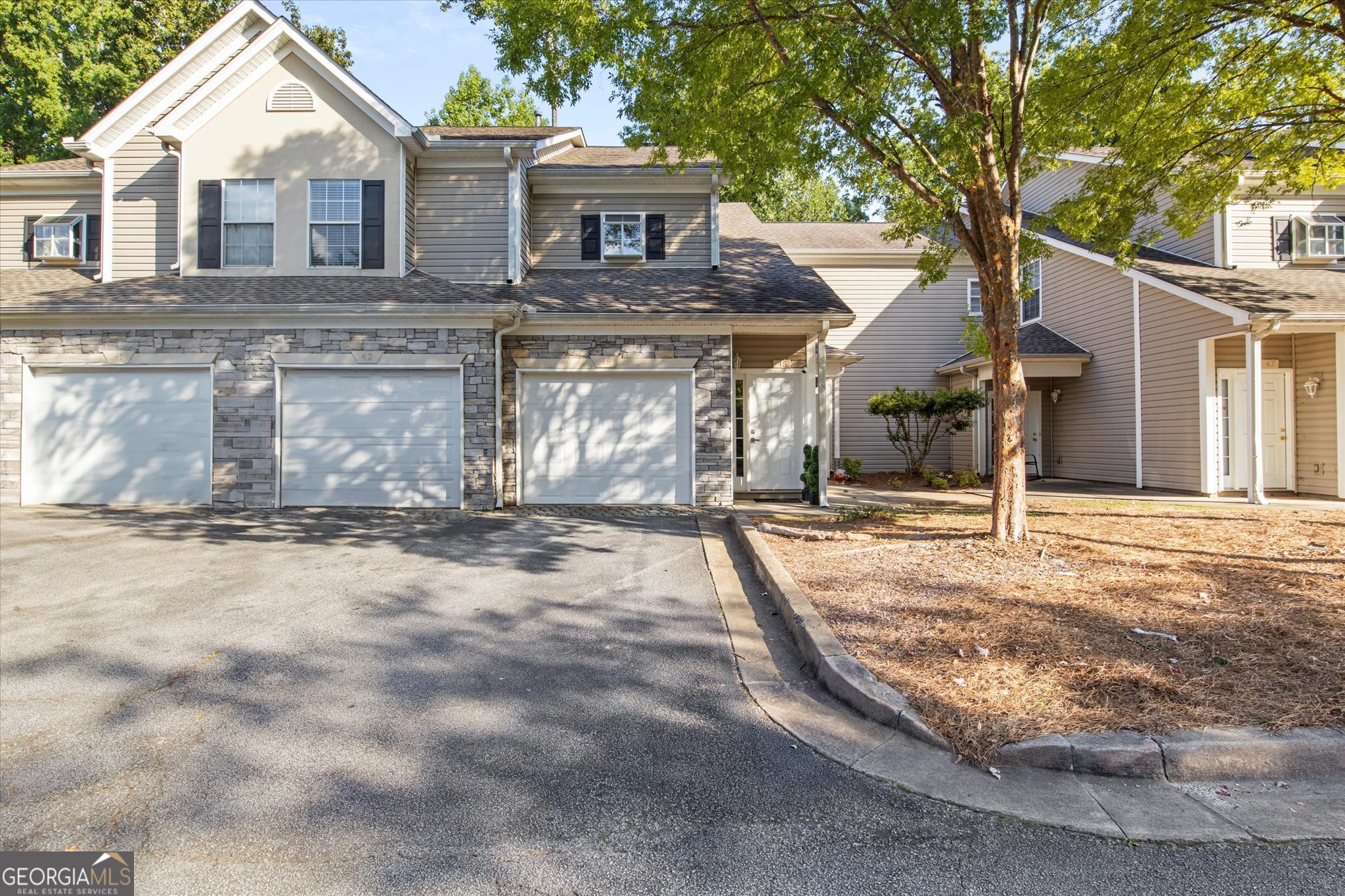 ***$5K TOWARDS CLOSING COSTS FOR OFFERS ACCEPTED BEFORE JAN 31! HOME PRICED BELOW APPRAISED VALUE*** Step into this inviting end unit 3-bedroom, 2-bathroom home that is perfect for first-time homebuyers or a small family. The HOA makes homeownership a breeze by covering water, trash, all exterior maintenance, and access to a pool and fitness center. As soon as you enter, immediately ascend the steps to be greeted by your home's spacious open floor plan. The living room, featuring a warm and welcoming fireplace, is the perfect space to relax or entertain. New flooring flows throughout the home, enhancing its fresh and stylish feel. The kitchen is a chef's dream, equipped with sleek stainless steel appliances that make cooking a pleasure. The master bedroom offers not one, but TWO spacious closets, providing ample storage for your wardrobe. Outside, you can enjoy the peaceful setting from your private balcony-an ideal spot for morning coffee or evening relaxation. Schedule your showing today!