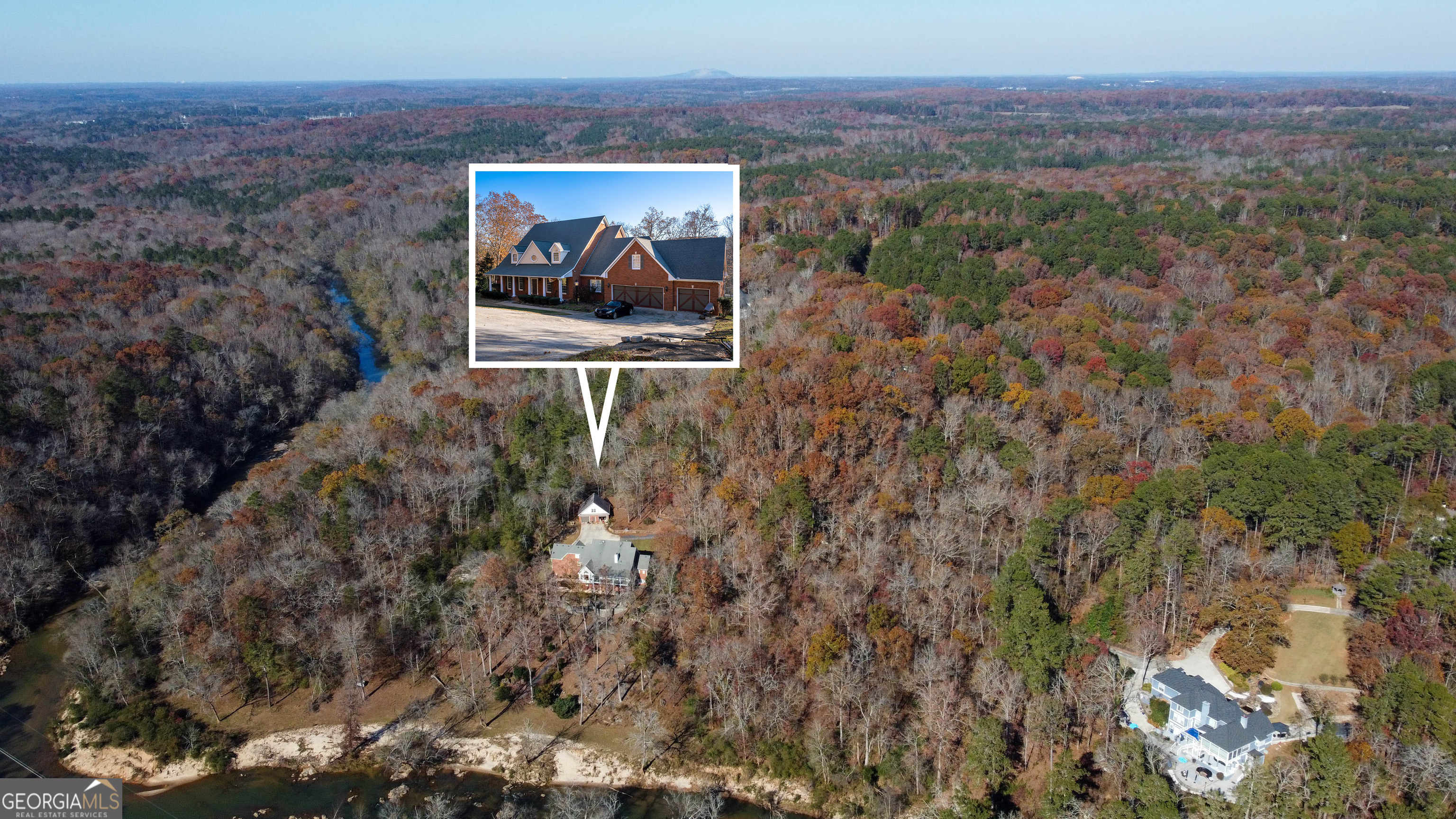 Please remember to call agent to show. One of a kind estate sitting on privacy- S River. Private gated entrance on cul-de-sac, loaded with azaleas and amazing look alike Ga Mts. Custom built, with 3 car garage attached, 2 car garage detached with separate stairs to bonus above. Gunite 30' inground pool, koi pond. back yard has 2 walls- great barbeque areas, 40' covered balcony, patio under. Walk up attic/4th level large/ can finish room in attic. Bonus/bedroom over 3 car garage. Main living has rose wood floors, solid tops in kit, all baths. Center island in kitchen, raised bar for extra sitting, walk in pantry. Loft area with built in book cases. Double foyer, first 2 story foyer has large dental blocks, built in book cases. Formal living has built in bookcases, formal dining off 2 story foyer. Open floor plan. with view of river from balcony and keeping room, center island in kit. breakfast bar, breakfast room opens to 2 story family room with fireplace, custom mantel hallway on 2nd floor overlooks foyer & family rm. Owner's suite on main with his & her walk in closets separate HVAC, amazing spacious vaulted bath, 2-man garden tub, solid service shower, separate vanities 5 HVAC systems. INLAW Suite in terrace level, wet bar, full eat in kitchen, breakfast bar, fireplace in trey ceiling den, full bath & half bath, large bedroom. Boat door for storage, 2 unfinished large rooms,14.5 acres. Newly painted interior & exterior. Custom built with many awesome features. 1000-foot private driveway. Privacy gate.