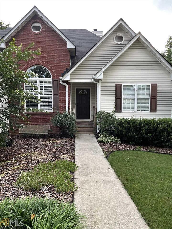 Look no further for your 5 bedroom, 3 full bath home on a finished basement in the Loganville school district! NO HOA! This home features a large family room, separate dining room, eat-in kitchen, with a master suite on the main level. Upstairs there is an additional bonus room/bedroom and the basement has a LARGE entertaining space/living room, full bath, and finished bar...all this with an above ground pool! Don't miss out on this rare opportunity.