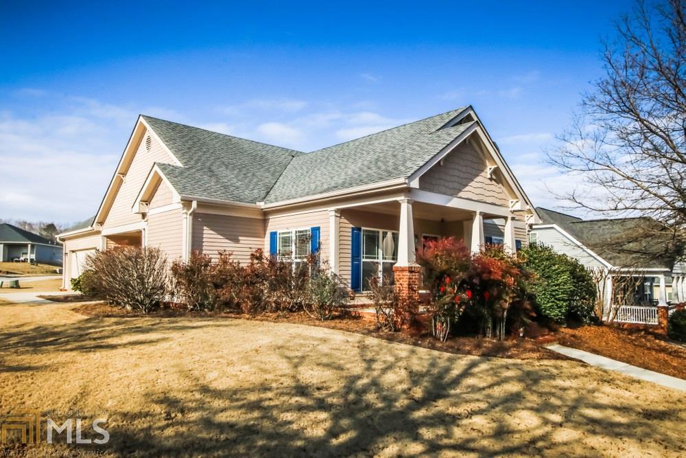 CHARMING CRAFTSMAN STEP LESS RANCH HOME IN ORCHARD PARK. 3 BED / 2.5 BATH HOME. MASTER ON MAIN W/ TREY CEILING, WALK-IN CLOSET, GARDEN TUB & SEPARATE SHOWER. 2 ADDITIONAL BEDS W/FULL BATH AND HALF BATH FOR GUEST. LARGE OPEN DEN AND DINING ROOM W/ PLENTY OF WINDOWS TO BRING IN LOTS OF LIGHT. BEAUTIFULLY LANDSCAPED LEVEL LOT W/2 CAR SIDE ENTRY GARAGE. EXTRA PARKING PAD. CHOOSE FROM THE SIDE COVERED PATIO OR THE ROCKING CHAIR FRONT PORCH FOR MORNING COFFEE OR EVENING COCKTAILS. NEW EXTERIOR PAINT. SWIM/TENNIS NEIGHBORHOOD W/ LAKE / PAVILION / GAZEBO AND LANDSCAPED STREETS/ SIDEWALKS. LOCATED ACROSS THE STREET FORM THE EXCITING NEW CINELEASE THREE RING MOVIE STUDIO AND LESS THAN 5 MILES FROM HISTORIC COVINGTON SQUARE WITH LOTS OF SHOPPING / DINING. LOW MAINTENANCE HOME, CONVENIENT TO I-20, 40 MINUTES TO ATLANTA, ATHENS, AND THE ATLANTA AIRPORT. THIS HOME WON'T LAST, COME SEE YOUR NEW HOME TODAY!
