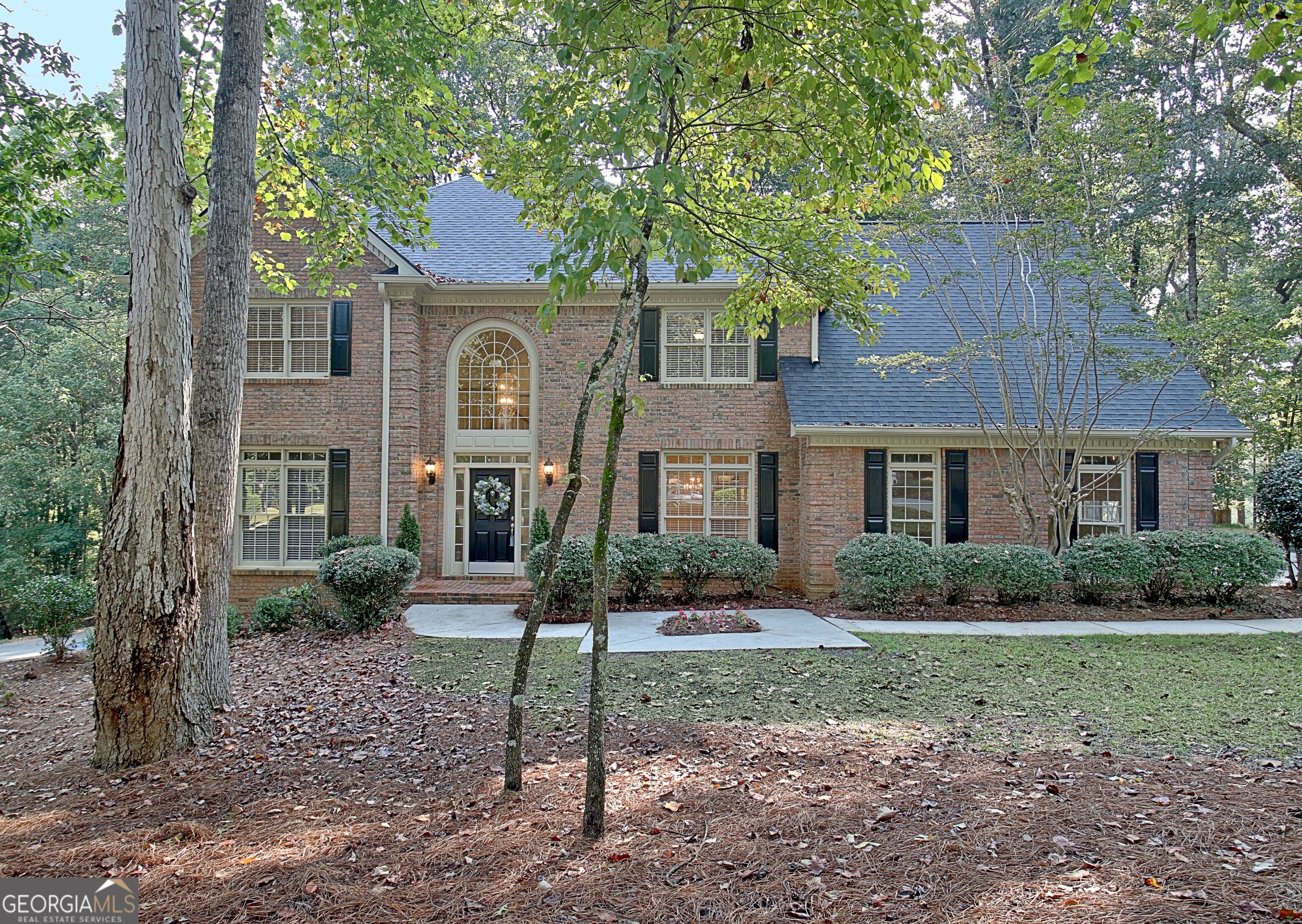 Discover your dream home in this stunning 4-bedroom, 2.5-bath residence with a partially finished basement on a private 1.1-acre wooded lot. The main level welcomes you with spacious living areas, filled with natural light and designed for both everyday living and entertaining. Upstairs, retreat to the serene owner's suite with a spa-inspired bath, while additional bedrooms offer comfort and flexibility for family or guests. New roof in 2024. Newer HVAC system. The finished basement is a true showstopper, featuring a soundproof theater room for the ultimate movie nights, plus a convenient kitchenette - ideal for hosting game days, gatherings, or extended-stay guests. Step outside to enjoy your very own retreat: a private, wooded 1.1-acre lot, offering space to relax, garden, or simply enjoy the beauty of nature. Perfectly located near shopping, dining, and schools, this home combines convenience, privacy, and style - all in one exceptional package.