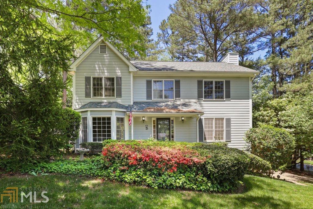 Beautiful home with a spacious and private backyard in East Cobb's Misty Forest Subdivision! The main level showcases a formal dining room, a fireside living room, and an eat-in kitchen with a view of the private backyard which features a large screen porch and uncovered deck. This home boast upgrades throughout to include: NEW INTERIOR PAINT, NEW CARPET, UPGRADED FIXTURES, NEW KITCHEN APPLIANCES, AND UPDATED BATHROOMS. Upstairs is devoted to sleep and relaxation offering a primary en-suite and three additional bedrooms share a hall bath. Partially finished basement at garage level that can be used as a workshop or mud room. All appliances remain with the property including the washer and dryer. This home features gracious interiors! The perfect layout on the main level coupled with the screened porch and back deck is also perfect for entertaining! Near schools in the top-rated Walton HS district! Within minutes of Cobb County Fuller Park, Merchant's Walk, and plenty of other shopping, restaurants, and entertainment. Welcome to your new gorgeous East Cobb home!