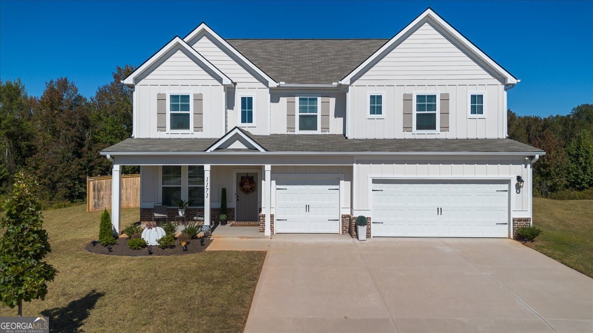 Luxury meets lifestyle in this like-new 5 Bedroom retreat! Tucked away in a quiet cul-de-sac on nearly 2 acres, this home delivers modern elegance, natural light, and an open floor plan that lives as beautifully as it entertains. The main level highlights include a coffered-ceiling dining room, executive trim package, and a versatile 5th bedroom for guests or a home office. The chef's kitchen features quartz countertops, Samsung Bespoke appliances, and an oversized island overlooking the family room. Upstairs, a spacious loft adds flexibility, and the expansive primary suite offers a sitting area plus a spa-inspired ensuite with stone-core flooring, soaking tub, and walk-in shower. Every inch of this home exudes quality, space, and sophistication. Don't just dream it-live it. Schedule your private tour today and experience the comfort, elegance, and space this home offers.
